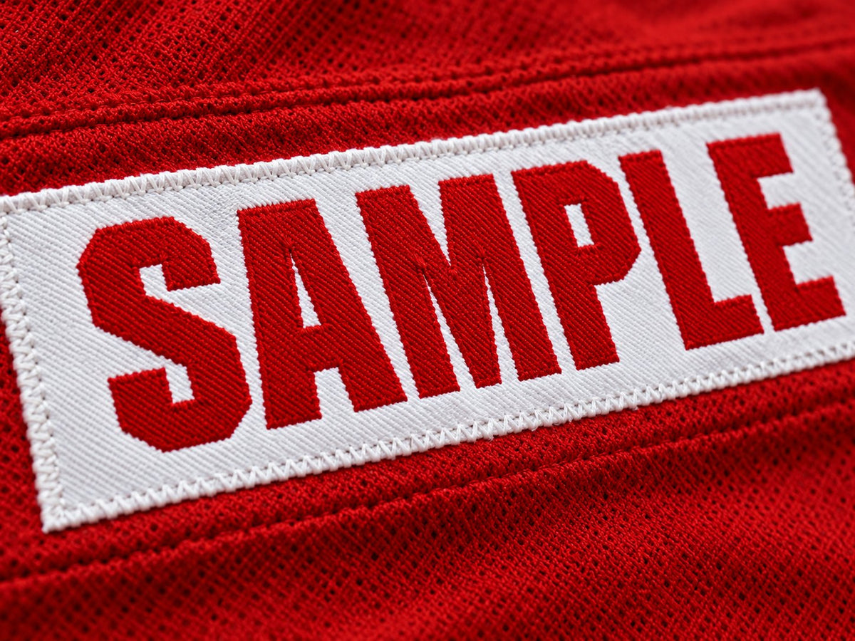 Close-up of stitched tackle-twill custom name bar